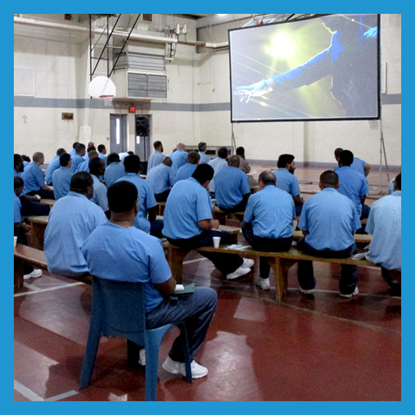 Inmates attend the GLS.