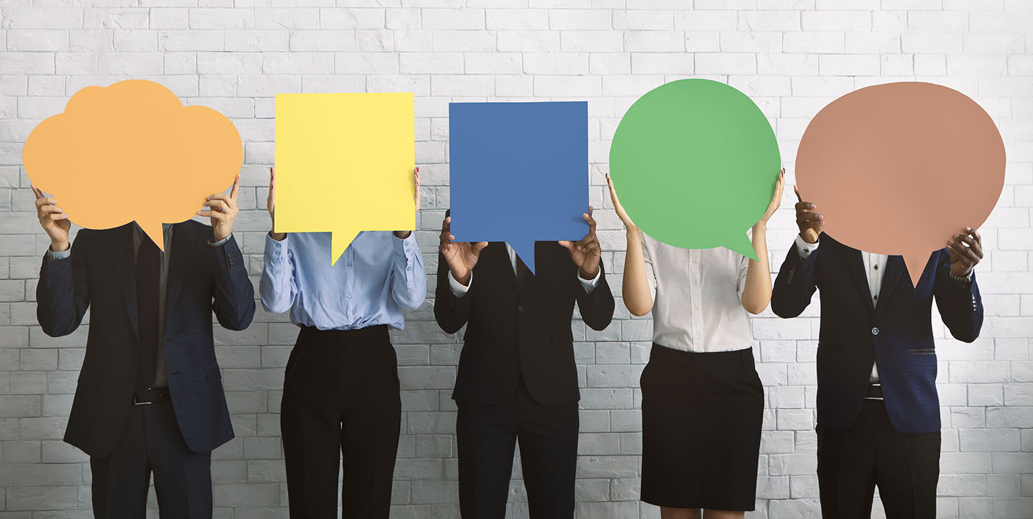 Business opinion concept. Group of corporate people hiding faces behind blank speech bubbles, empty space